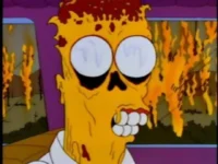 Personaje de dibujos animados con cabeza de calavera y cabello en llamas, fondo de incendio.